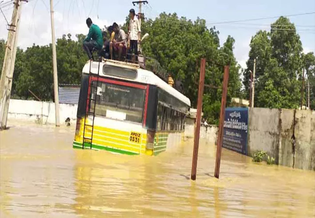 Heavy Floods Surrounds Nandyal Division in Kurnool - Sakshi