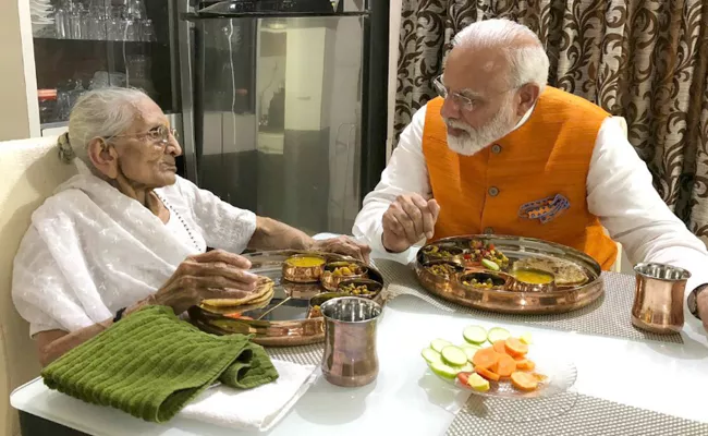 PM Modi Has Birthday Lunch With Mother - Sakshi