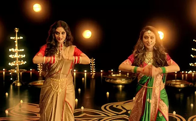 Nusrat Jahan and Mimi Chakraborty Dance for Durga Puja Theme Song - Sakshi