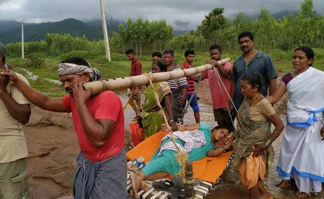 Pregnant Woman Carried Makeshift Stretcher In Vizianagaram District - Sakshi