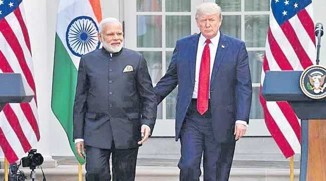 Trump hints at some announcement at Howdy Modi event in Houston - Sakshi