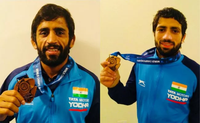 Bajrang Punia And Ravi Dahiya Win World Wrestling Championships - Sakshi