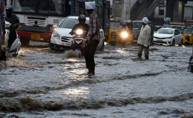 Hyderabad Rains Break Old Record, Water Logging In Many Areas - Sakshi