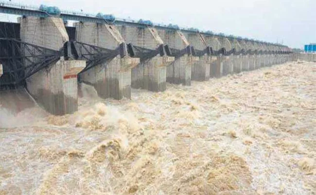 Flood to Prakasam Barrage; Collecter Alerted Authorities - Sakshi