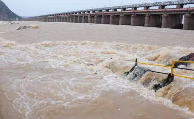 Prakasam Barrage Six Gates Are Open For flooding in Krishna District - Sakshi