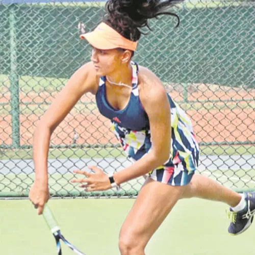 Rashmika In Main Draw Of Fenesta Open - Sakshi