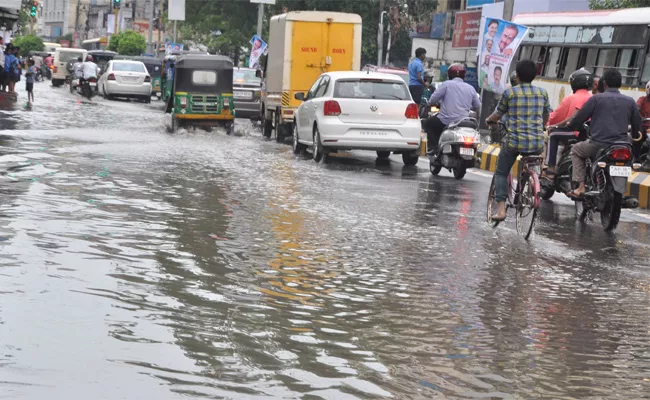 Heavy Rain Fall In vijayawada  - Sakshi