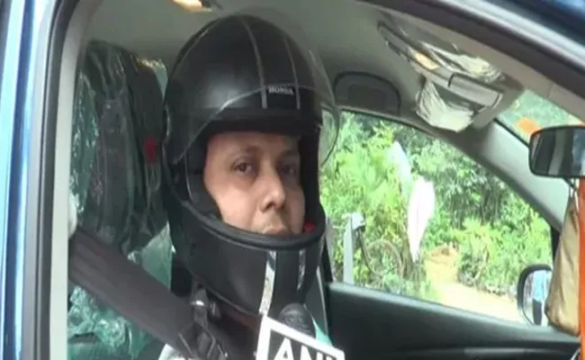 Aligarh Man Wearing Helmet While Driving Car After Get E Challan - Sakshi