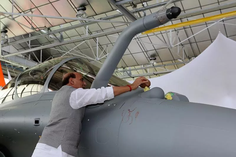 Rajnath Singh Defends Performing 'Shastra Puja' For Rafale Jet - Sakshi