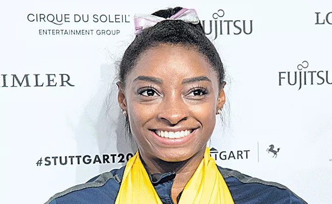 Simone Biles Breaks Gymnastics Worlds Medals Record - Sakshi