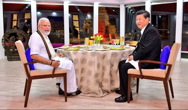 Narendra Modi-Xi Jinping contest for chairs - Sakshi