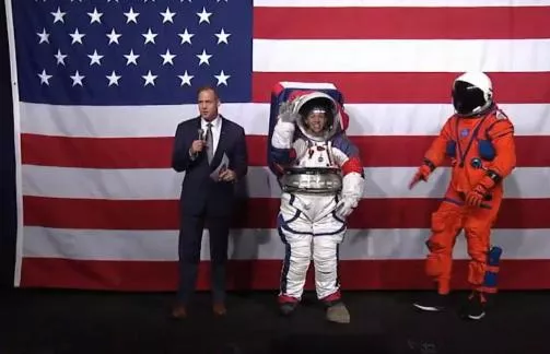 Nasa unveils new spacesuit for next Moon landing - Sakshi