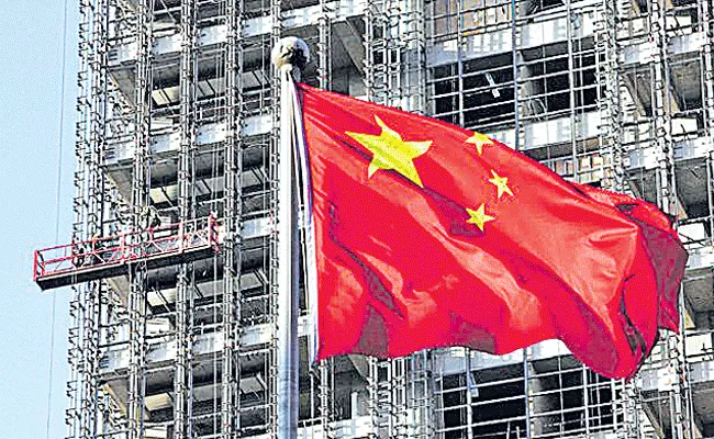 China Economic Growth Drops To Lowest Level Since 1992 - Sakshi