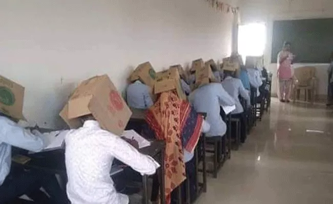 Karnataka Students Made To Wear Cartons In Exam Center - Sakshi