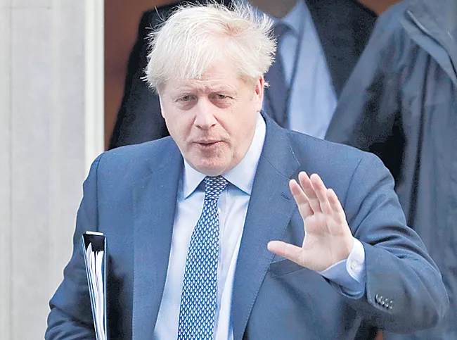 Brexit vote setback for Boris Johnson in Parliament - Sakshi