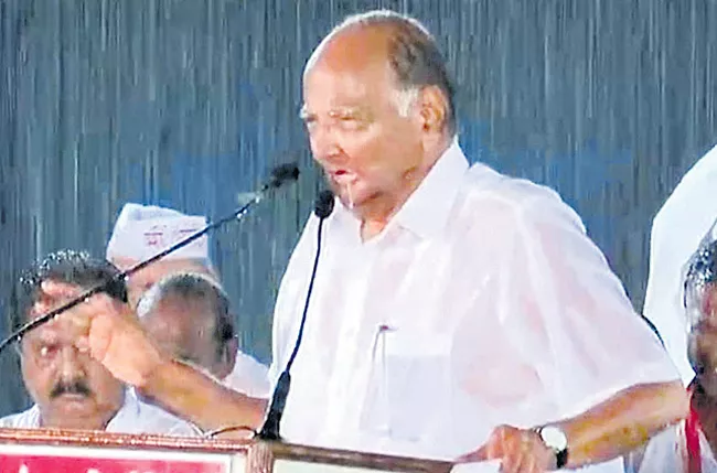 Sharad Pawar continues his speech even as it rains in Maharashtra - Sakshi