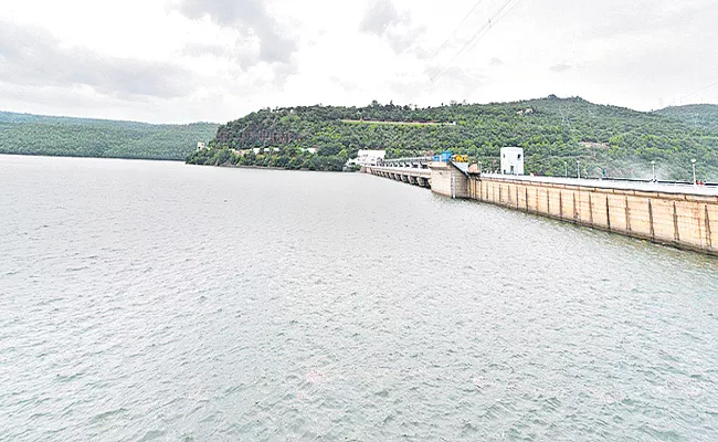 Krishna flood flow to Srisailam dam for seventh time - Sakshi