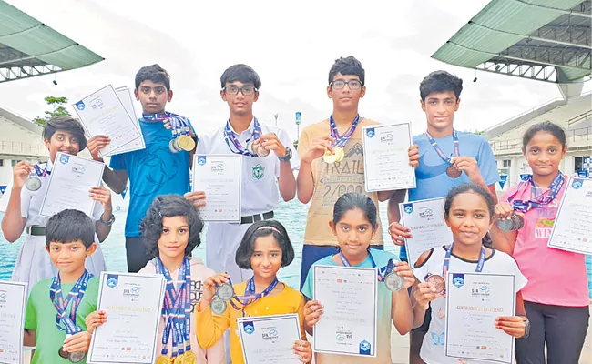 Shivani Gets Five Gold Medals In Swimming - Sakshi