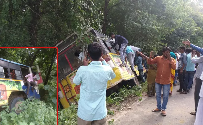 RTC Bus Slips A Side From Road In Nizamabad - Sakshi