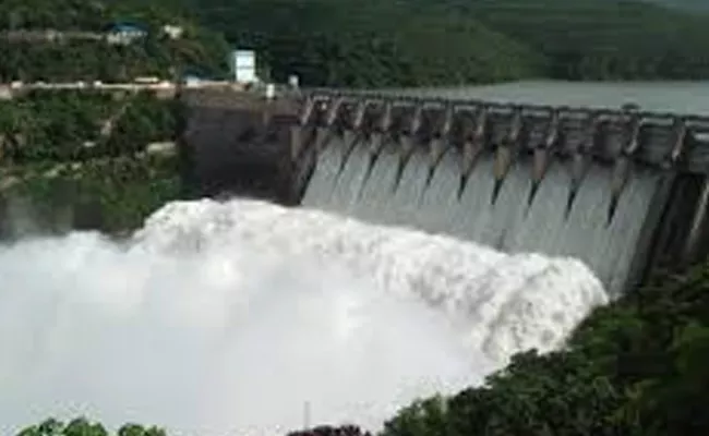 Record Water Flow In Srisailam Dam After 35 Years - Sakshi