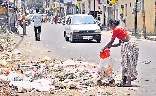 Teacher Was Fined For Leave Garbage On Road In Ranga Reddy District - Sakshi