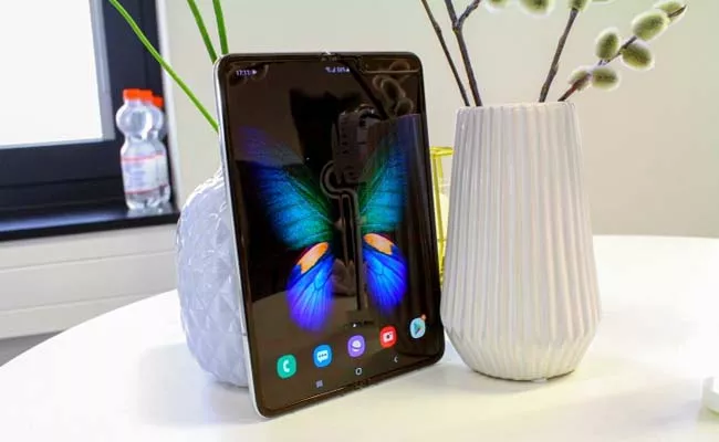  Record sale Samsung  Galaxy Fold phones sold 30 mins in India - Sakshi