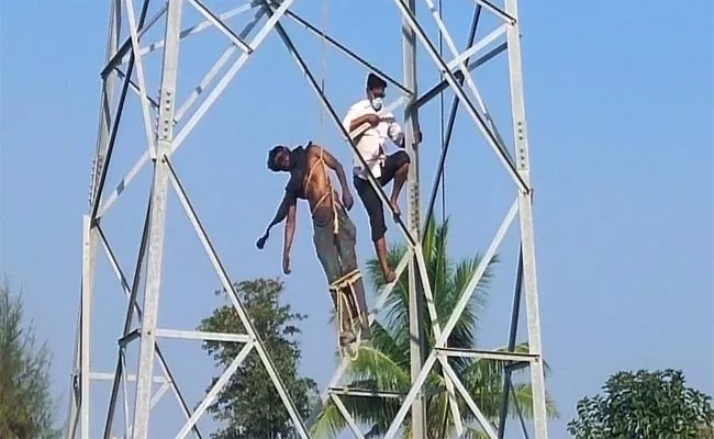 Odisha Man Commits Suicide by Climbing High Tension Tower - Sakshi