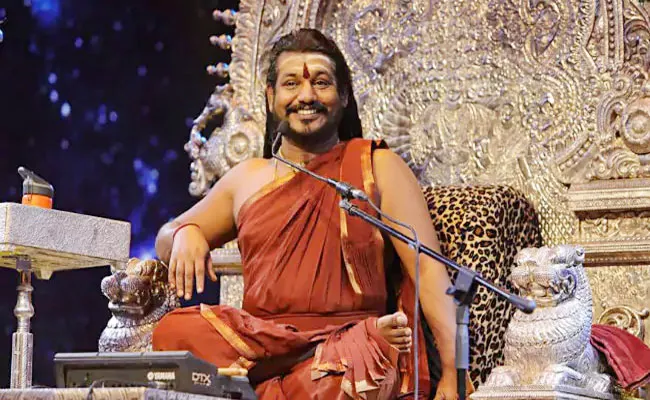 Couple Came To GJ High Court Alleges Their Daughters Held In Swami Nithyananda Ashram - Sakshi