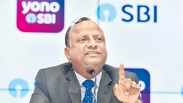 SBI Chairman hopes IBC timeline be adhered to in DHFL - Sakshi