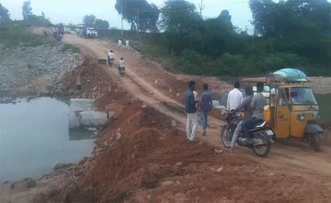 Temporary Bridge Constructed To Devada In Bichkunda - Sakshi