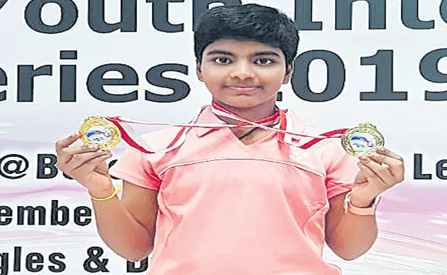 Navya Got Two Medals In Singapore Youth International Series Tournament - Sakshi