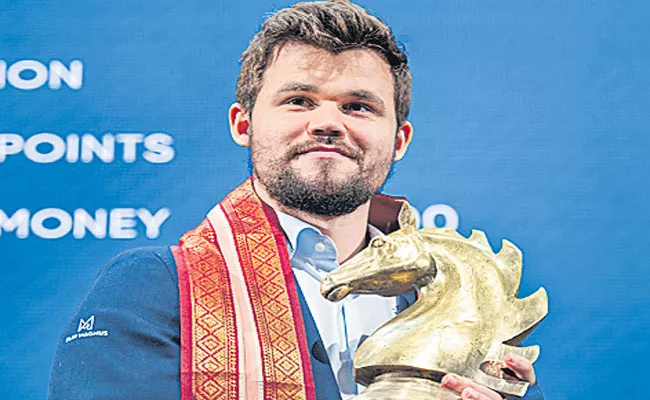 Magnus Carlsen Tata Chess Winner - Sakshi