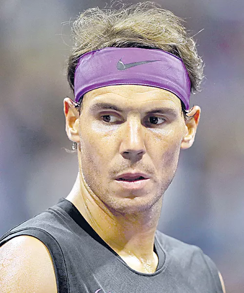 Rafael Nadal Reclaims World Number One Spot - Sakshi