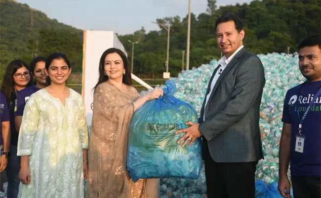  Reliance employees give new life to waste plastic bottles - Sakshi