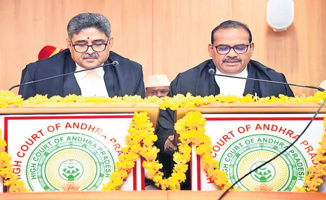 Justice Rakesh Kumar sworn in as High Court judge - Sakshi