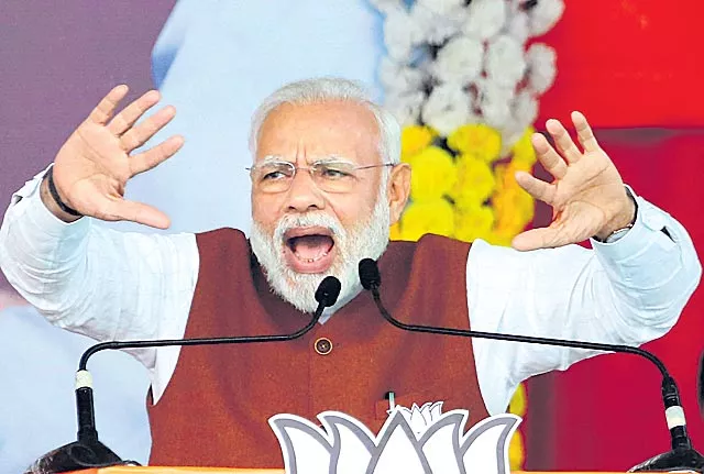 PM Modi messages appeal for calm in Assam and a promise - Sakshi