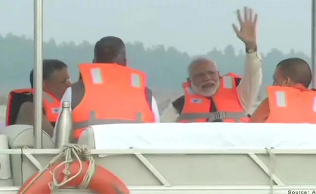 PM Modi Boat Ride In Ganga To Visit Namami Gange Project Works - Sakshi