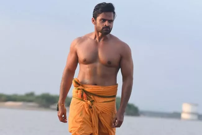 Sai Dharam Tej Shows his Six Pack in Prathi Roju Pandage - Sakshi