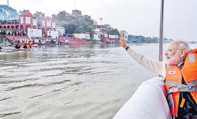 PM Narendra Modi chairs meeting of Ganga council in Kanpur - Sakshi