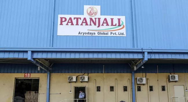 Patanjali Ayurved completes acquisition of Ruchi soya - Sakshi