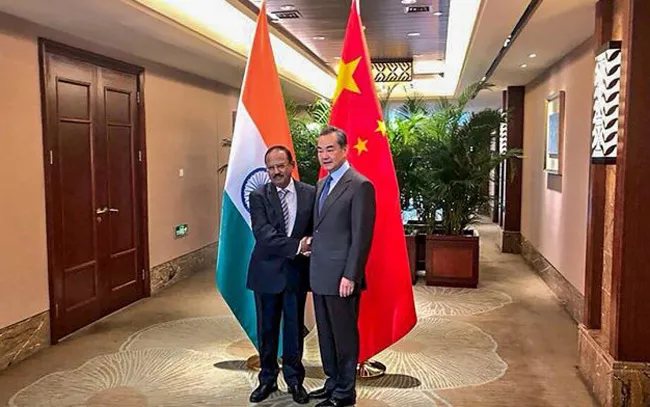 Boundary talks: Chinese Foreign Minister, Ajit Doval to Meet Today - Sakshi