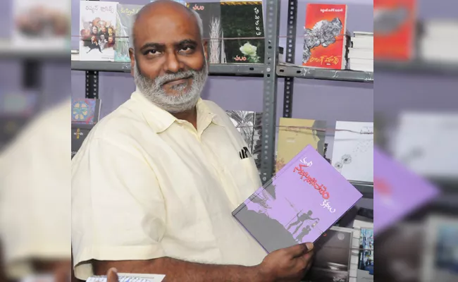 MM Keeravani Visit Book Fair in NTR Stadium Hyderabad - Sakshi