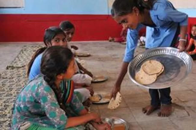 60 students fall ill after consuming hostel food in Nalgonda - Sakshi