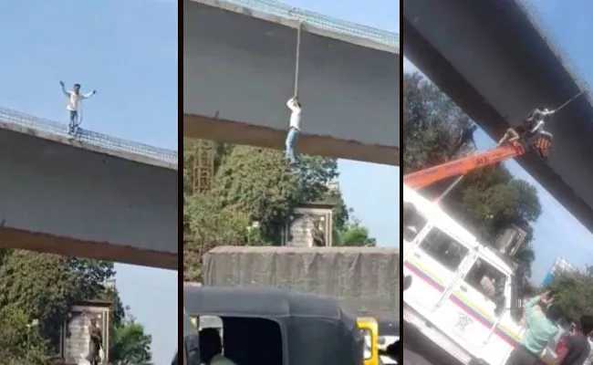 Shocking : Man Attempts Suicide by Hanging Self from a Bridge - Sakshi