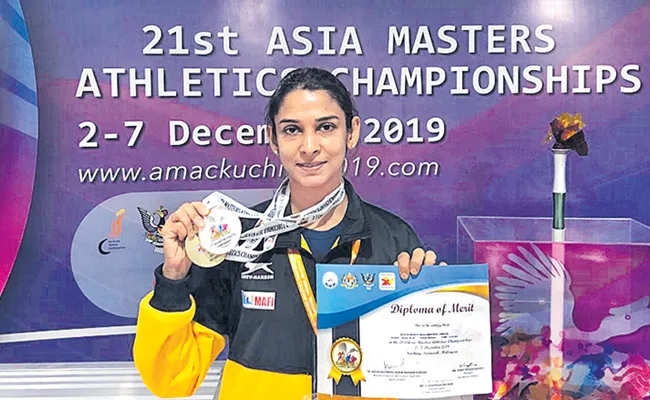 Athlet Divya Reddy Wins Another Gold Medal In Asia Masters Championship - Sakshi