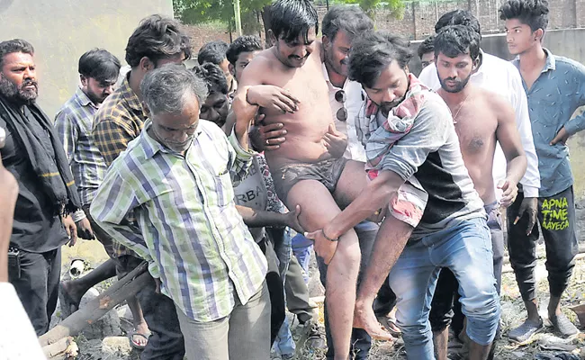 People Saved Drainage Man At Nizamabad - Sakshi