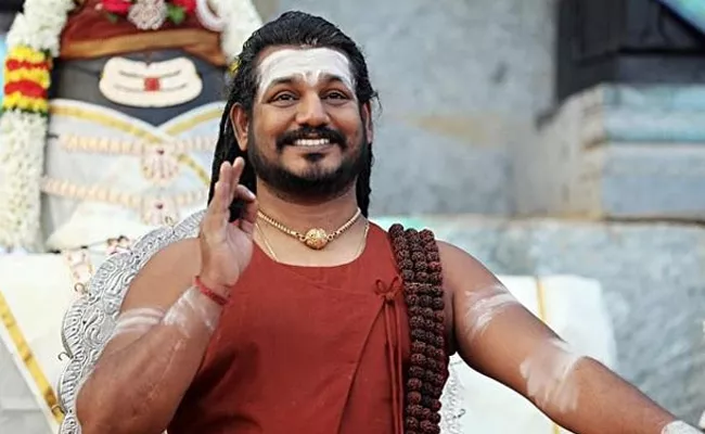 NIthyananda May Announce PM For Kailasa Port - Sakshi