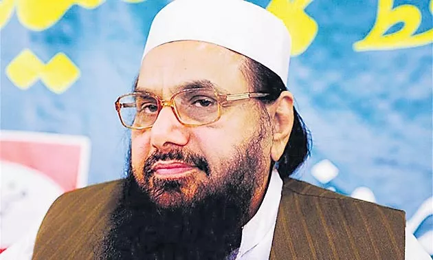 Hafiz Saeed indictment in terror financing case delayed as officials fail - Sakshi