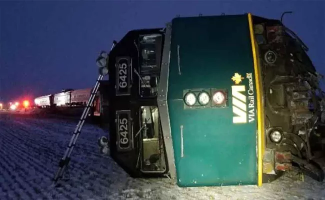 13 killed As Train Derails In Canada Manitoba Province - Sakshi