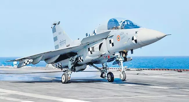 Light Combat Aircraft lands on INS Vikramaditya - Sakshi